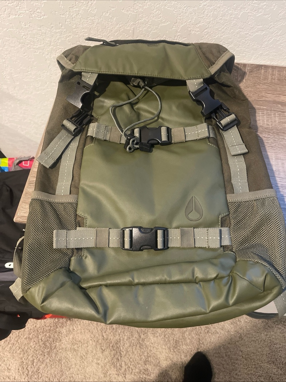 Nixon Olive Green Roll-Top Backpack with Black Buckles